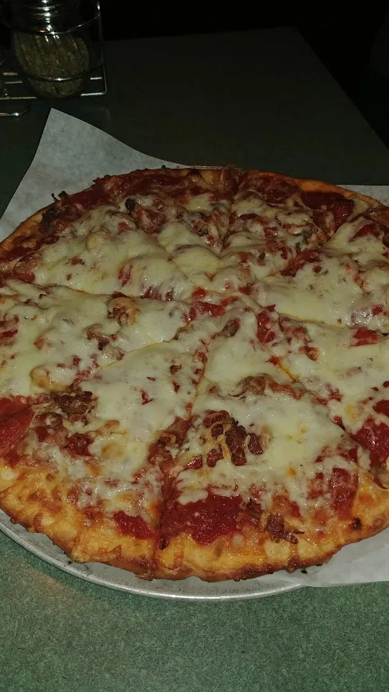 Larry's Special Pizza Mushrooms Pepperoni Sausage Onions and Sweet Peppers